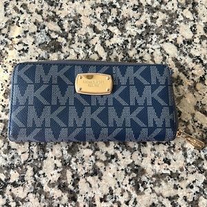 Michael Kors navy blue clutch wallet with gold accents